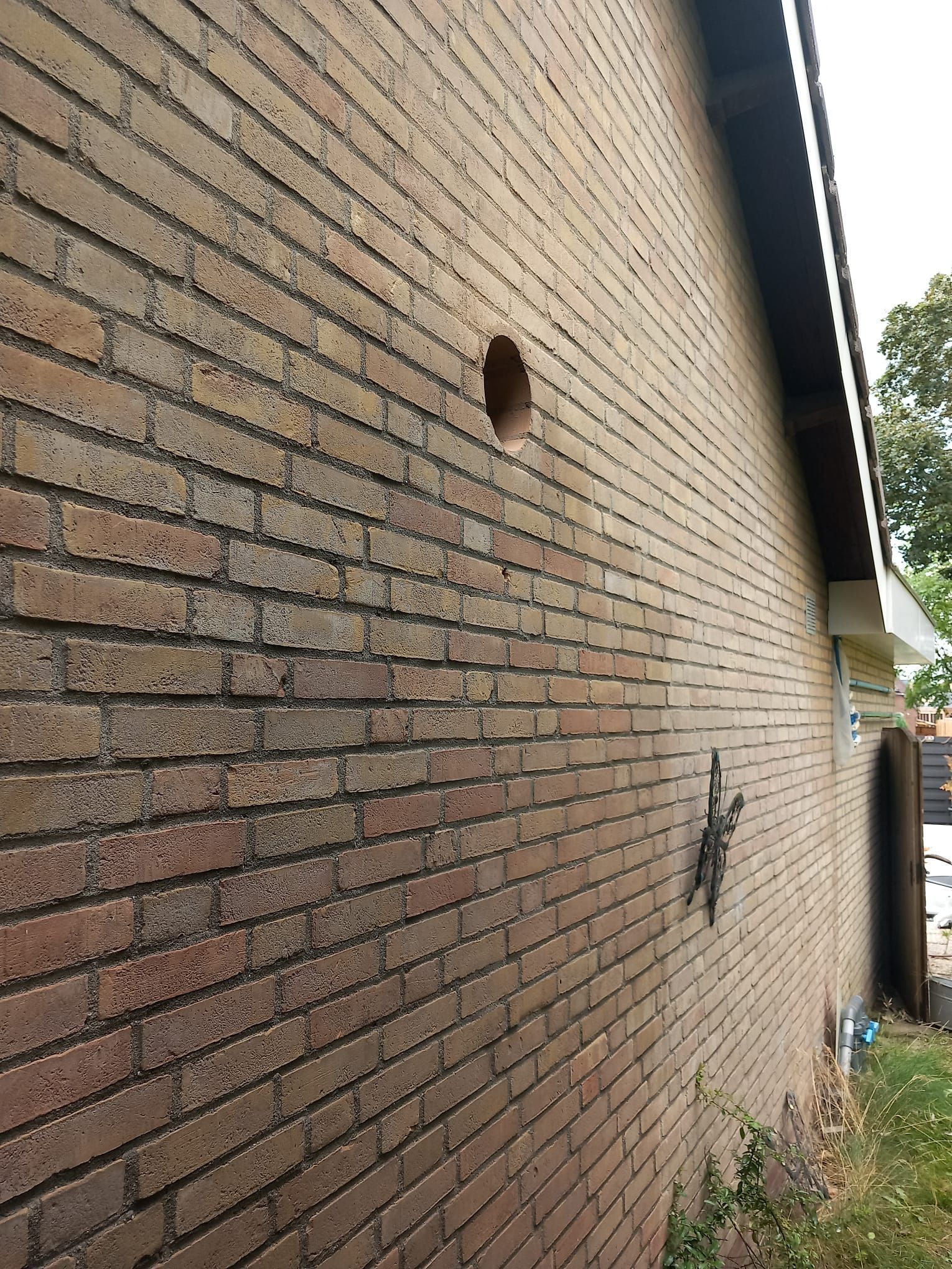 Koude lucht door de afzuigkap: terugslagklep, rooster en geveldoorvoer